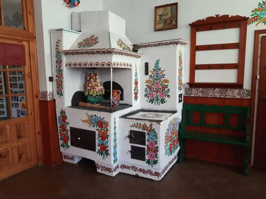 Interior of painted house in Zalipie showing folk art designs